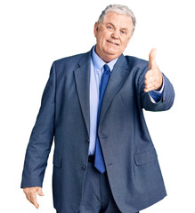 Senior grey-haired man wearing business jacket smiling friendly offering handshake as greeting and welcoming. successful business.