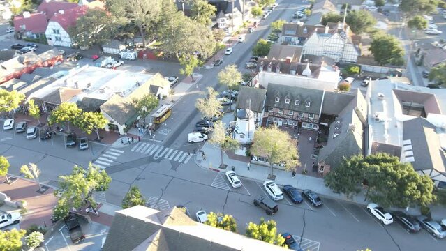 Aerial Flyback Reveal of Solvang Valley&rsquo;s Hamlet Square, in the golden glow of sunset at Hamlet Square, gradually revealing the enchanting entirety of Solvang Valley.