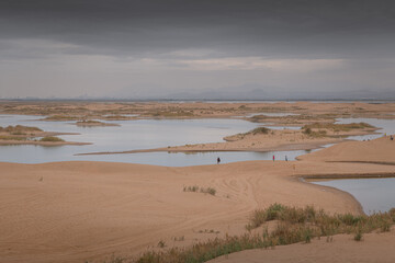 The river going through the desert in Wuhai, Inner Mongolia, China