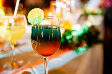 Colorful alcoholic drinks are served at wedding in Dominican Republic - obrazy, fototapety, plakaty