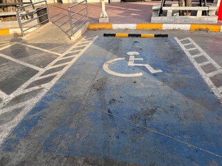 Sign or symbol of disabled parking. Standard construction for handicap and old aged people in Asia. 