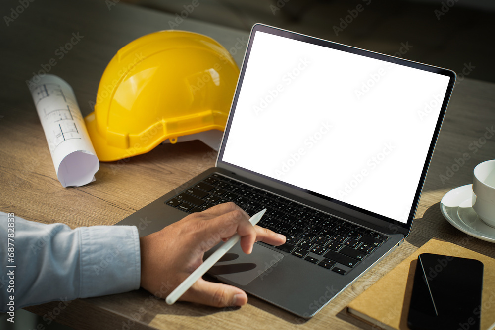 Poster freelancer typing on laptop laptop with blank screen on table. workspace background copy space scree