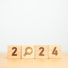 2024 block with magnifying glass icon. SEO, Search Engine Optimization, hiring , Advertising, Idea,...