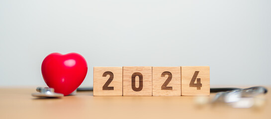 2024 Happy New Year for health care, Insurance, Wellness and medical concept. Stethoscope of doctor...