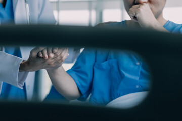 Doctor telling to patient woman the results of her medical tests. Doctor showing medical records to...