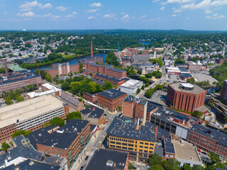 Fototapeta premium Massachusetts Mills aerial view at the mouth of Concord River to Merrimack River in historic downtown Lowell, Massachusetts MA, USA. 