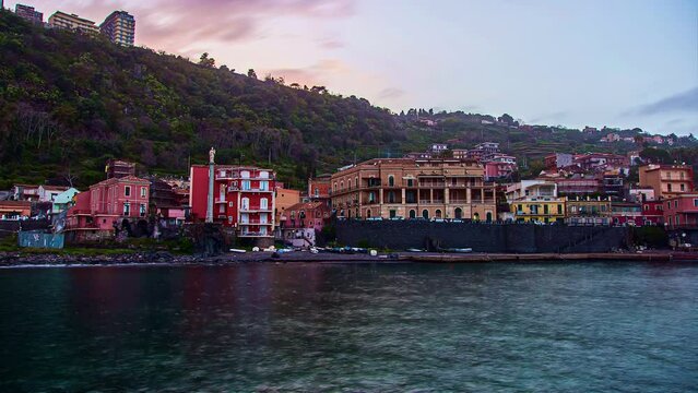 Sunset Over Seaside Neighborhood Of Santa Maria La Scala In Catania, Sicily, Italy. timelapse