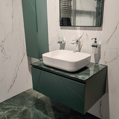 fashionable modern bathroom design in green and white tones