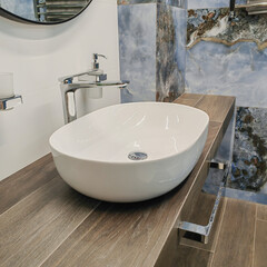 sink in a modern bathroom in beige tones