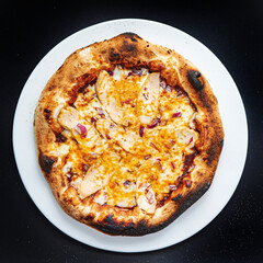 pizza on the black background, top view