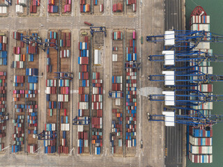Aerial top view of Container ship loading and unloading, Cargo container in deep seaport