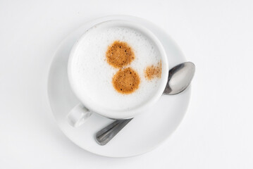 cup of cappuccino on the white