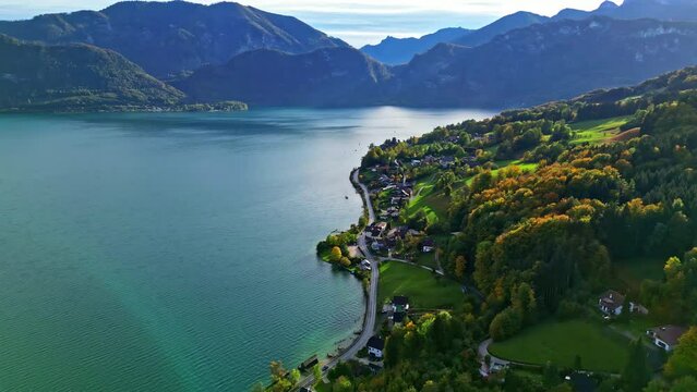 Beautiful Aerial countryside view of Attersee Lake, Salzkammergut, and the Alps mountains from Unterach. Upper Austria, near Salzburg.