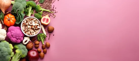 Poster Brain-boosting foods on pink background. Energizing food and mental wellbeing. Healthy living. Space for text. Overhead view. Mindful eating plan. © 2rogan