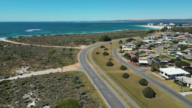 Coastal sunny dreamy road in Geraldton, Western Australia. Aerial