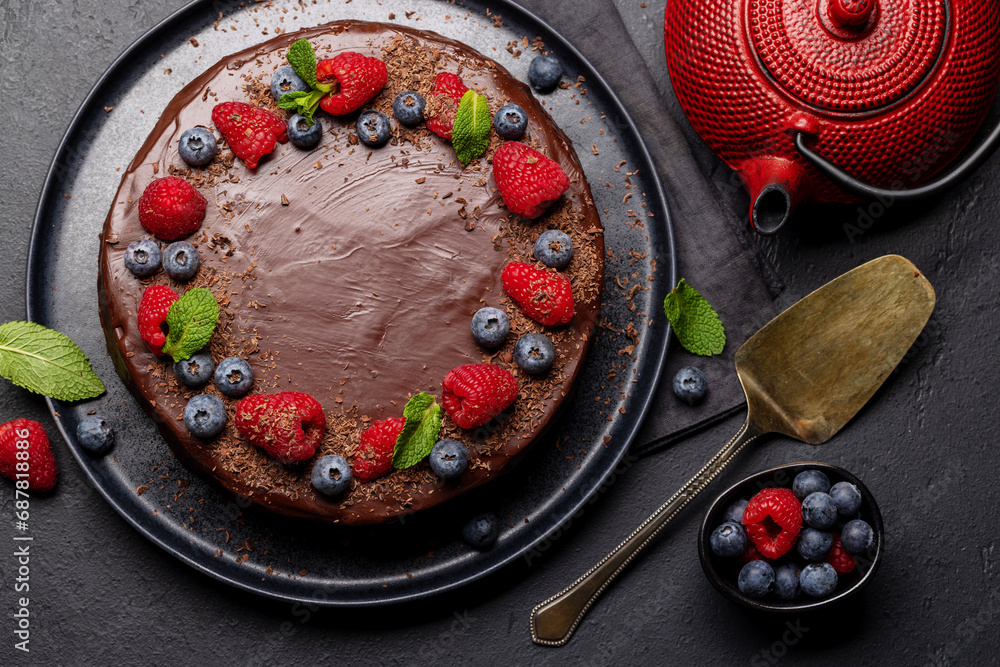 Sticker chocolate cake dessert with fresh berries