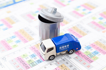 ゴミ収取車とカレンダー