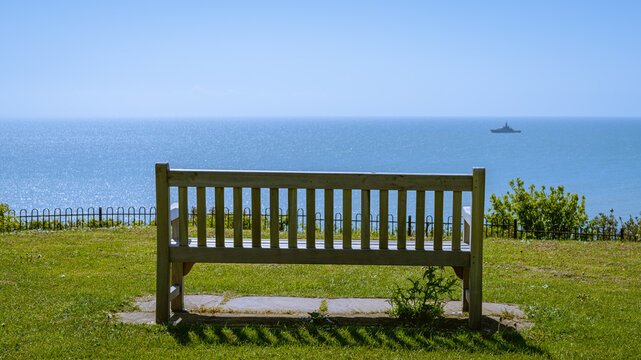 Bench overlooking the Channel at the Lower Leas Coastal Park in Folkestone, Kent, England