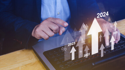 Interest rate and dividend concept, Businessman with percentage symbol and up arrow, 2024, Interest...