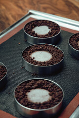 Chocolate dough on baking tray. 