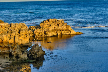 Discover sheltered bay beaches and wild surf beaches, blowholes, caves and unusual rock formations...