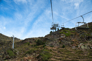 Creussans chairlift in the mountain ski resort of Andorra. Going up to the solar viewpoint of...