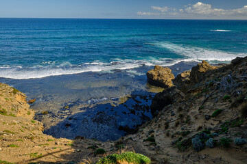 Discover sheltered bay beaches and wild surf beaches, blowholes, caves and unusual rock formations...