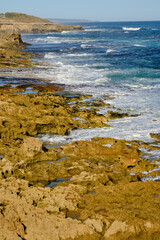 Discover sheltered bay beaches and wild surf beaches, blowholes, caves and unusual rock formations...