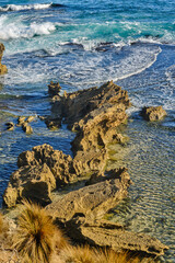 Discover sheltered bay beaches and wild surf beaches, blowholes, caves and unusual rock formations...