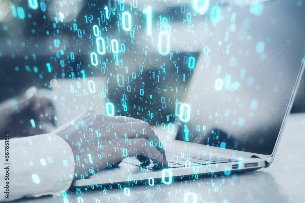 Wall mural Close up of male hands using laptop at desk with coffee cup and creative binary coding on blurry outdoor background with trees. Matrix and security concept. Double exposure.