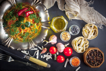School supplies are laid out in a composition on a light background. Back to school.