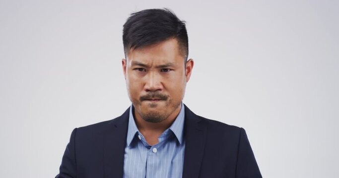 Angry, businessman or face with stress in studio on white background with burnout, anxiety or disaster. Profile, risk or dissapointed male person frustrated by an anger problem, mistake or loss