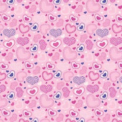 Seamless pattern with drawn Doodle hearts in pink tones.