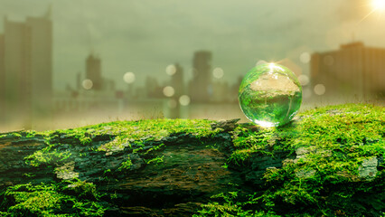 Carbon dioxide reduction concept. Crystal ball with economic city background. future growth...