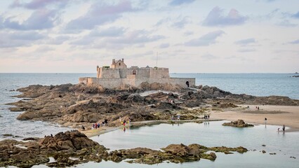 Stunning view of a grand castle on a rocky island in Saint-Malo, France