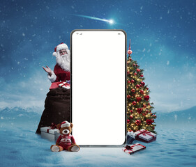 Big smartphone, Santa Claus and gifts