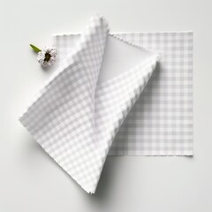Gingham cloth on white background with copyspace. Top view handkerchief  fold it paper napkin for meals checkered Generative AI 