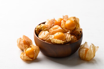 Cape gooseberry, Goldenberry or Physalis peruviana in bowl on white background