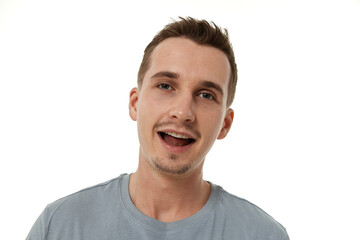 Obraz premium portrait of young smiling man on white background