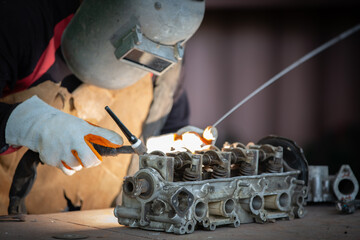 Welder is welding Tungsten Inert Gas welding, Welding aluminum with aluminum argon, TIG welding...