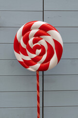 swirl lollipop candy on a wooden background