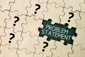 wooden puzzle and question mark with the word problem statement. PROBLEM STATEMENT concept