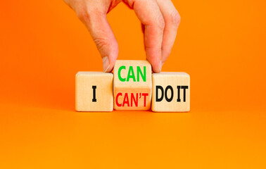 I can do it symbol. Concept word I can or can not do it on beautiful wooden cubes. Beautiful orange...