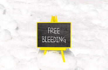 Free bleeding symbol. Concept words Free bleeding on beautiful black chalk blackboard. Beautiful...