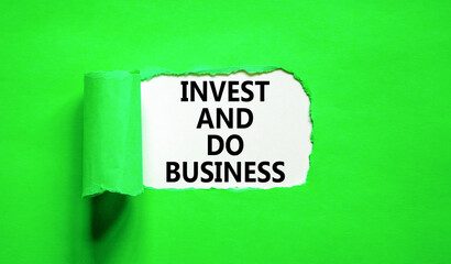 Invest and do business symbol. Concept word Invest and do business on beautiful white paper. Beautiful green paper background. Invest and do business concept. Copy space.