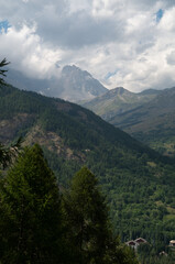 Alpine panorama near Bardonecchia with cloudy skies in the distance