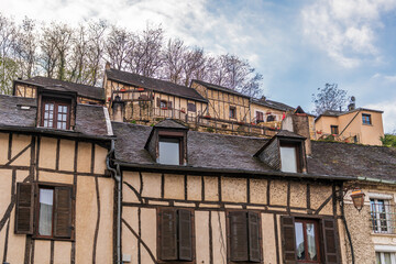 Half-timbered houses on the left bank at Terrasson Lavilledieu, in Dordogne, Nouvelle-Aquitaine,...