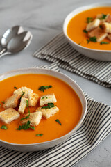Homemade Butternut Squash Soup in a Bowl, side view.
