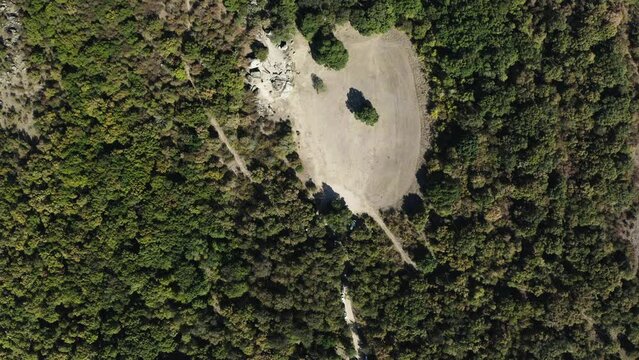 Overhead drone shot of the ancient cult's prehistoric rock formations of Beglik Tash in Primorsko, Bulgaria.