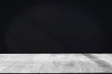 Black wall in empty room with empty table Simple color tone Elegant background for product...
